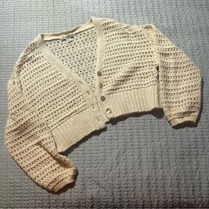 Off-white knit cropped cardigan with buttons